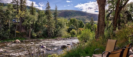 Relax on the banks of the Eagle River right in your back yard!
