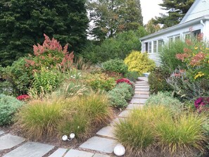 Entrance to the house with fall gardens