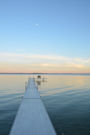 Enjoy the tranquility of West Bay at dusk.