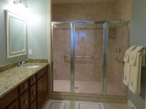 Master bath with granite and two showerheads; handicapped accessible