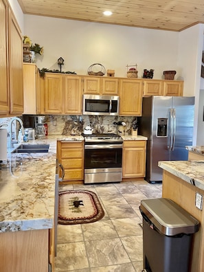Remodel Kitchen with granite counter tops, stocked with everything you need.