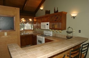 Gourmet kitchen with breakfast bar!