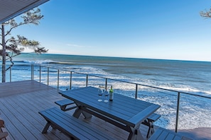  Large picnic tables, seating and BBQ on deck