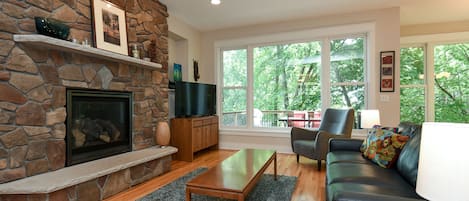 Bright, light-filled great room. Cozy up by the gas fireplace!