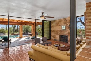 Living with massive sliding doors to pool patio!