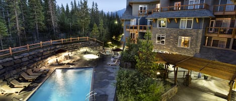 The view from your deck of the year round heated pool & hot tubs.
