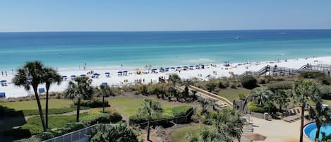 BEACH SHOT FROM BALCONY OVER LOOKING THE 2 POOLS, YOUR TROPICAL OASIS AWAITS YOU