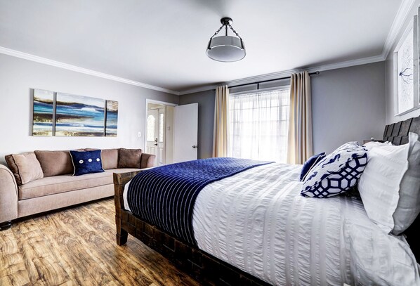 Inviting "Malibu" Cal King downstairs bedroom w/ bathroom and daybed sofa.