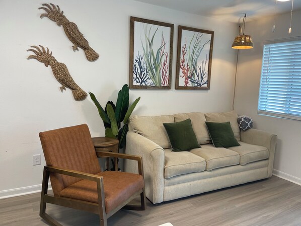 Cozy living room with memory foam fold out couch