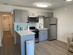 Kitchen with appliances and all kitchenware needs
