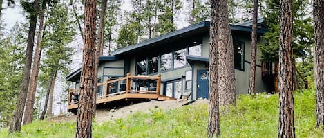 Nature House. Perched on a hillside in the woods, overlooking Flathead Lake.  