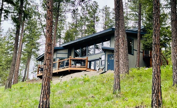 Nature House. Perched on a hillside in the woods, overlooking Flathead Lake.  