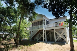 A large screen porch and two huge decks provide a nice view over the back yard.