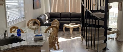 Front door through kitchen to living area
