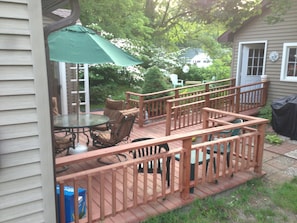 The wooded backyard deck. The ramp provides stair-free access to the house.