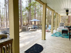 Covered area and deck with seating 
