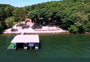 Lakeside view of Log Home and Dock