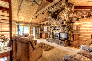 Living Room, Main level, access to deck looking over the lake.