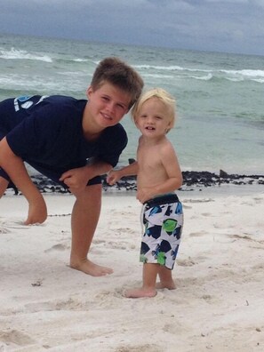 The kids having fun on the beach
