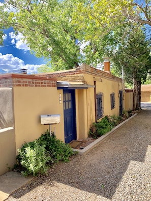 Side/alley entrance into home.
Two parking spots available with our property