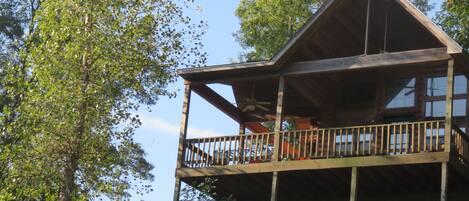 View of cabin from fishing dock. Plenty of outdoor seating 