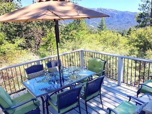 Our tree-top deck boasts unparalleled views. Relax and grill a gourmet meal.