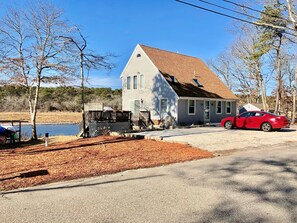 Big yard for the kiddos to play.  Kayak stand with 3 kayaks, 1 canoe, a zodiac. 