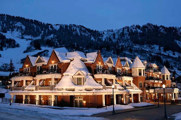 Ground level exterior view of the Hyatt Grand Aspen in Winter.