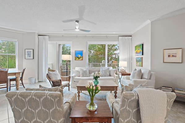 Looking Toward The Living Room From The Aisle Behind The Swivel Chairs