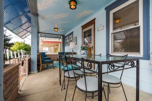 covered outside porch with 6 places for outside dining