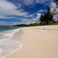 Prestine white sand beach for miles in both directions. . .