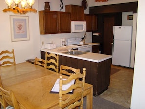 Dining room and fully equipped kitchen