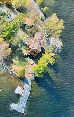Early spring seaplane view of cabin along point