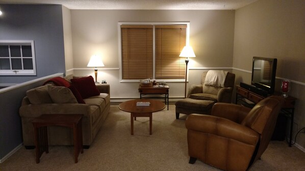 Spacious, comfortable upper level living room - flows to dining room and kitchen