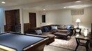 Huge lower level rec room - wood stove, pool table, giant sectional, large TV