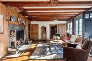 Sitting room with fireplace & views of the valley