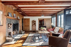 Sitting room with fireplace & views of the valley