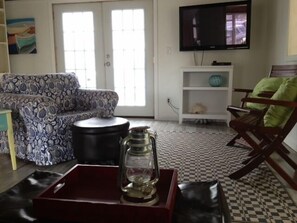 Living room with French Doors to the deck