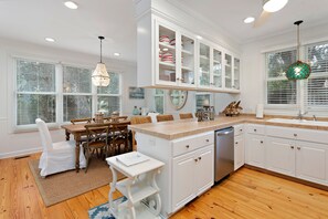 Kitchen with bar area adjacent to the dining room