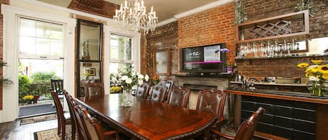 Dining room seats 12. Kitchen island seats 10.