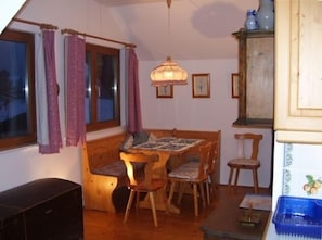 Cosy dining nook with stunning mountain views.