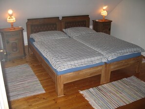 Bedroom #1: king-sized bed with option of separating it into 2 single beds.