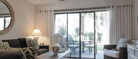 Living room with view to patio