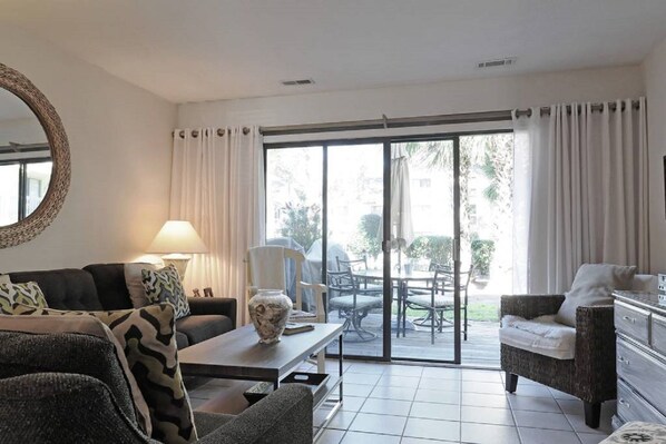 Living room with view to patio