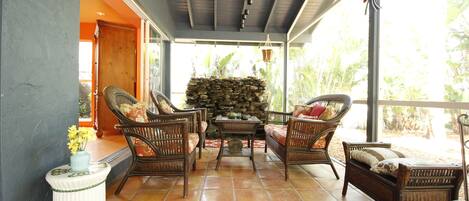 Private Front Porch surrounded by tropical native plants. Perfect for lounging!