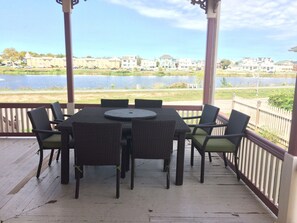 Great eating area on front porch overlook the lake and ocean