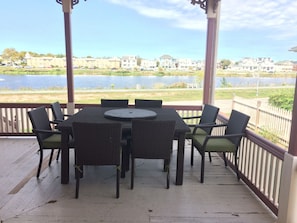 Great eating area on front porch overlook the lake and ocean