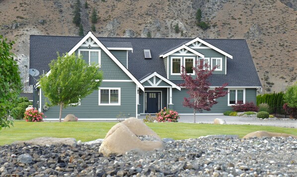 Front of house from far side of front lawn.