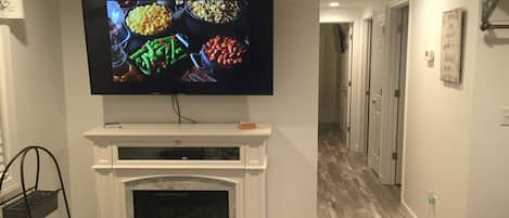 60" tv in living room with HD cable