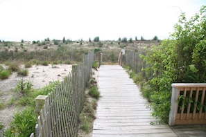 Short walkway to sand and ocean!
